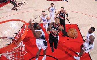 PORTLAND, OR - FEBRUARY 9: Damian Lillard #0 of the Portland Trail Blazers shoots the ball during the game against the Orlando Magic on February 9, 2021 at the Moda Center Arena in Portland, Oregon. NOTE TO USER: User expressly acknowledges and agrees that, by downloading and or using this photograph, user is consenting to the terms and conditions of the Getty Images License Agreement. Mandatory Copyright Notice: Copyright 2021 NBAE (Photo by Sam Forencich/NBAE via Getty Images)