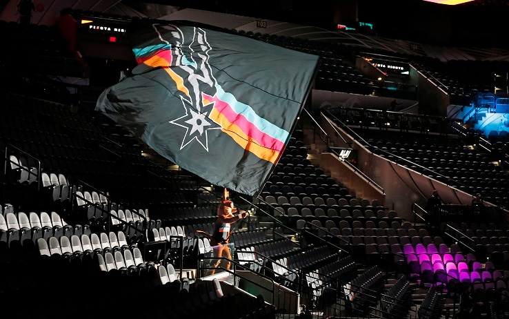 1294190120 SAN ANTONIO, TX - JANUARY 1: With Covid not allowing fans yet Coyote mascot for the San Antonio Spurs goes into the empty stands during their team introduction against the Los Angeles Lakers at AT&T Center on January 1, 2021 in San Antonio, Texas. NOTE TO USER: User expressly acknowledges and agrees that , by downloading and or using this photograph, User is consenting to the terms and conditions of the Getty Images License Agreement. (Photo by Ronald Cortes/Getty Images)