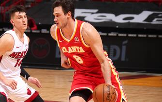 MIAMI, FL - MARCH 2: Danilo Gallinari #8 of the Atlanta Hawks dribbles against the Miami Heat on March 2, 2021 at American Airlines Arena in Miami, Florida. NOTE TO USER: User expressly acknowledges and agrees that, by downloading and or using this Photograph, user is consenting to the terms and conditions of the Getty Images License Agreement. Mandatory Copyright Notice: Copyright 2021 NBAE (Photo by Issac Baldizon/NBAE via Getty Images)