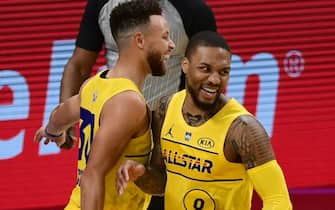 ATLANTA, GA - MARCH 7: Damian Lillard #0, Chris Paul #3, Stephen Curry #30 of Team LeBron celebrate during the 70th NBA All Star Game as part of 2021 NBA All Star Weekend on March 7, 2021 at State Farm Arena in Atlanta, Georgia. NOTE TO USER: User expressly acknowledges and agrees that, by downloading and or using this photograph, User is consenting to the terms and conditions of the Getty Images License Agreement. Mandatory Copyright Notice: Copyright 2021 NBAE (Photo by Adam Hagy/NBAE via Getty Images)