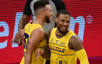 ATLANTA, GA - MARCH 7: Damian Lillard #0, Chris Paul #3, Stephen Curry #30 of Team LeBron celebrate during the 70th NBA All Star Game as part of 2021 NBA All Star Weekend on March 7, 2021 at State Farm Arena in Atlanta, Georgia. NOTE TO USER: User expressly acknowledges and agrees that, by downloading and or using this photograph, User is consenting to the terms and conditions of the Getty Images License Agreement. Mandatory Copyright Notice: Copyright 2021 NBAE (Photo by Adam Hagy/NBAE via Getty Images)