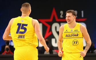 ATLANTA, GA - MARCH 7: Nikola Jokic #15 and Luka Doncic #77 of Team LeBron smile and run up court during the 70th NBA All Star Game as part of 2021 NBA All Star Weekend on March 7, 2021 at State Farm Arena in Atlanta, Georgia. NOTE TO USER: User expressly acknowledges and agrees that, by downloading and or using this photograph, User is consenting to the terms and conditions of the Getty Images License Agreement. Mandatory Copyright Notice: Copyright 2021 NBAE (Photo by Joe Murphy/NBAE via Getty Images)