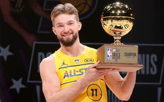 ATLANTA, GA - MARCH 7:  Domantas Sabonis #11 of Team LeBron holds the Taco Bell Skills Challenge trophy during the Taco Bell Skills Challenge as part of 2021 NBA All Star Weekend on March 7, 2021 at State Farm Arena in Atlanta, Georgia. NOTE TO USER: User expressly acknowledges and agrees that, by downloading and or using this photograph, User is consenting to the terms and conditions of the Getty Images License Agreement. Mandatory Copyright Notice: Copyright 2021 NBAE (Photo by Nathaniel S. Butler/NBAE via Getty Images)