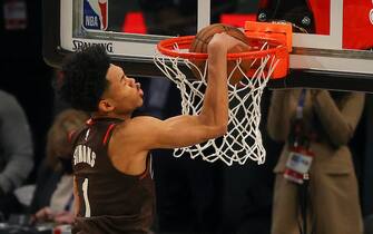 1305892774 ATLANTA, GEORGIA - MARCH 07: Anfernee Simons of the Portland Trail Blazers competes in the 2021 NBA All-Star - AT&T Slam Dunk Contest during All-Star Sunday Night at State Farm Arena on March 07, 2021 in Atlanta, Georgia. (Photo by Kevin C. Cox/Getty Images)