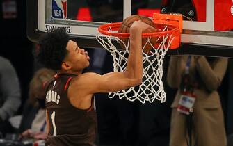 ATLANTA, GEORGIA - MARCH 07:  Anfernee Simons of the Portland Trail Blazers competes in the 2021 NBA All-Star - AT&T Slam Dunk Contest during All-Star Sunday Night at State Farm Arena on March 07, 2021 in Atlanta, Georgia. (Photo by Kevin C. Cox/Getty Images)