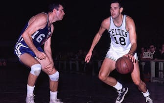 BOSTON - 1967:  Bailey Howell #18 of the Boston Celtics makes a move up court against Jerry Lucas #16 of the Cincinnati Royals during a game played in 1967 at the Boston Garden in Boston, Massachusetts. NOTE TO USER: User expressly acknowledges and agrees that, by downloading and or using this photograph, User is consenting to the terms and conditions of the Getty Images License Agreement. Mandatory Copyright Notice: Copyright 1967 NBAE (Photo by Dick Raphael/NBAE via Getty Images)