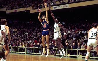 BOSTON - 1974:  Phil Jackson #19 of the New York Knicks shoots over Paul Silas #35 of the Boston Celtics during a game played in 1974 at the Boston Garden in Boston, Massachusetts. NOTE TO USER: User expressly acknowledges and agrees that, by downloading and or using this photograph, User is consenting to the terms and conditions of the Getty Images License Agreement. Mandatory Copyright Notice: Copyright 1974 NBAE (Photo by Dick Raphael/NBAE via Getty Images)