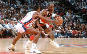 AUBURN HILL, MI - CIRCA 1990:  Terry Porter #30 of the Portland Trail Blazers drives on Isiah Thomas #11 of the Detroit Pistons during an NBA basketball game circa 1990 at The Palace of Auburn Hills in Auburn Hills, Michigan. Porter played for the Trail Blazers from 1985-95. (Photo by Focus on Sport/Getty Images) *** Local Caption *** Terry Porter; Isiah Thomas
