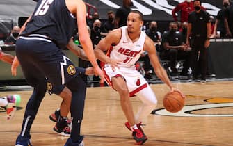 MIAMI, FL - JANUARY 27: Avery Bradley #11 of the Miami Heat handles the ball during the game against the Denver Nuggets on January 27, 2021 at American Airlines Arena in Miami, Florida. NOTE TO USER: User expressly acknowledges and agrees that, by downloading and or using this Photograph, user is consenting to the terms and conditions of the Getty Images License Agreement. Mandatory Copyright Notice: Copyright 2021 NBAE (Photo by Issac Baldizon/NBAE via Getty Images)
