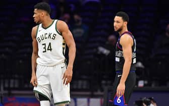 PHILADELPHIA, PA - MARCH 17: Giannis Antetokounmpo #34 of the Milwaukee Bucks and Ben Simmons #25 of the Philadelphia 76ers look on during a game on March 17, 2021 at Wells Fargo Center in Philadelphia, Pennsylvania. NOTE TO USER: User expressly acknowledges and agrees that, by downloading and/or using this Photograph, user is consenting to the terms and conditions of the Getty Images License Agreement. Mandatory Copyright Notice: Copyright 2021 NBAE (Photo by Jesse D. Garrabrant/NBAE via Getty Images) 