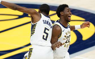 INDIANAPOLIS, IN - MARCH 24: Edmond Sumner #5 of the Indiana Pacers and Caris LeVert #22 of the Indiana Pacers celebrate during the game against the Detroit Pistons at Bankers Life Fieldhouse on March 24, 2021 in Indianapolis, Indiana. NOTE TO USER: User expressly acknowledges and agrees that, by downloading and or using this photograph, User is consenting to the terms and conditions of the Getty Images License Agreement.  (Photo by Michael Hickey/Getty Images)