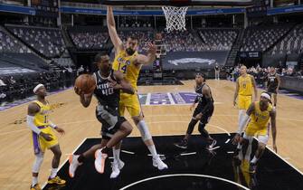 SACRAMENTO, CA - APRIL 2: Harrison Barnes #40 of the Sacramento Kings passes the ball during the game against the Los Angeles Lakers on April 2, 2021 at Golden 1 Center in Sacramento, California. NOTE TO USER: User expressly acknowledges and agrees that, by downloading and or using this Photograph, user is consenting to the terms and conditions of the Getty Images License Agreement. Mandatory Copyright Notice: Copyright 2021 NBAE (Photo by Rocky Widner/NBAE via Getty Images)