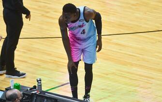 MIAMI, FL - APRIL 08: Victor Oladipo #4 of the Miami Heat holds his right knee after being injured in the second half against the Los Angeles Lakers at American Airlines Arena on April 8, 2021 in Miami, Florida.  NOTE TO USER: User expressly acknowledges and agrees that,  by downloading and or using this photograph,  User is consenting to the terms and conditions of the Getty Images License Agreement.(Photo by Eric Espada/Getty Images)