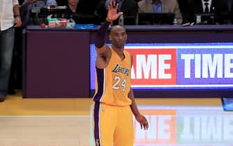LOS ANGELES, CA - APRIL 13:  Kobe Bryant #24 of the Los Angeles Lakers waves to the crowd as he is taken out of the game after scoring 60 points against the Utah Jazz at Staples Center on April 13, 2016 in Los Angeles, California. NOTE TO USER: User expressly acknowledges and agrees that, by downloading and or using this photograph, User is consenting to the terms and conditions of the Getty Images License Agreement.  (Photo by Sean M. Haffey/Getty Images)