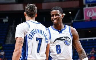 ORLANDO, FL - APRIL 12: Michael Carter-Williams #7 of the Orlando Magic high fives Dwayne Bacon #8 of the Orlando Magic during the game against the San Antonio Spurs on April 12, 2021 at Amway Center in Orlando, Florida. NOTE TO USER: User expressly acknowledges and agrees that, by downloading and or using this photograph, User is consenting to the terms and conditions of the Getty Images License Agreement. Mandatory Copyright Notice: Copyright 2021 NBAE (Photo by Fernando Medina/NBAE via Getty Images)