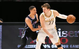 DALLAS, TX - APRIL 18: Luka Doncic #77 of the Dallas Mavericks dribbles the ball during the game against the Sacramento Kings on April 18, 2021 at the American Airlines Center in Dallas, Texas. NOTE TO USER: User expressly acknowledges and agrees that, by downloading and or using this photograph, User is consenting to the terms and conditions of the Getty Images License Agreement. Mandatory Copyright Notice: Copyright 2021 NBAE (Photo by Glenn James/NBAE via Getty Images)