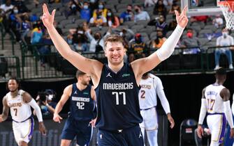 DALLAS, TX - APRIL 24: Luka Doncic #77 of the Dallas Mavericks celebrates during the game against the Los Angeles Lakers on April 24, 2021 at the American Airlines Center in Dallas, Texas. NOTE TO USER: User expressly acknowledges and agrees that, by downloading and or using this photograph, User is consenting to the terms and conditions of the Getty Images License Agreement. Mandatory Copyright Notice: Copyright 2021 NBAE (Photo by Glenn James/NBAE via Getty Images)