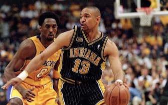 19 Jun 2000: Mark Jackson #13 of the Indiana Pacers dribbles the ball down the court as he is guarded by Kobe Bryant #8 of the Los Angeles Lakers  during the NBA Finals Game 6 at the Staples Center in Los Angeles, California.  The Lakers defeated the Pacers in 116-111.    NOTE TO USER: It is expressly understood that the only rights Allsport are offering to license in this Photograph are one-time, non-exclusive editorial rights. No advertising or commercial uses of any kind may be made of Allsport photos. User acknowledges that it is aware that Allsport is an editorial sports agency and that NO RELEASES OF ANY TYPE ARE OBTAINED from the subjects contained in the photographs.Mandatory Credit: Jed Jacobsohn  /Allsport
