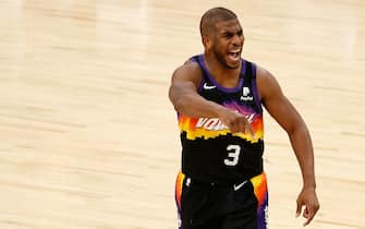 PHOENIX, ARIZONA - APRIL 07: Chris Paul #3 of the Phoenix Suns reacts during the second half of the NBA game against the Utah Jazz at Phoenix Suns Arena on April 07, 2021 in Phoenix, Arizona. The Suns defeated the Jazz 117-113 in overtime.  NOTE TO USER: User expressly acknowledges and agrees that, by downloading and or using this photograph, User is consenting to the terms and conditions of the Getty Images License Agreement. (Photo by Christian Petersen/Getty Images)