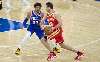 PHILADELPHIA, PA - APRIL 30: Matisse Thybulle #22 of the Philadelphia 76ers defends against Danilo Gallinari #8 of the Atlanta Hawks in the fourth quarter at the Wells Fargo Center on April 30, 2021 in Philadelphia, Pennsylvania. The 76ers defeated the Hawks 126-104. NOTE TO USER: User expressly acknowledges and agrees that, by downloading and or using this photograph, User is consenting to the terms and conditions of the Getty Images License Agreement. (Photo by Mitchell Leff/Getty Images)