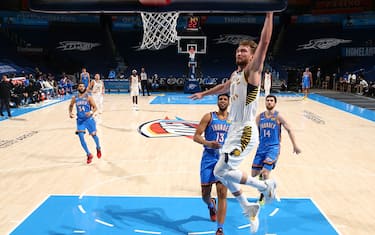 OKLAHOMA CITY, OK - MAY 1: Domantas Sabonis #11 of the Indiana Pacers dunks the ball during the game against the Oklahoma City Thunder on May 1, 2021 at Chesapeake Energy Arena in Oklahoma City, Oklahoma. NOTE TO USER: User expressly acknowledges and agrees that, by downloading and or using this photograph, User is consenting to the terms and conditions of the Getty Images License Agreement. Mandatory Copyright Notice: Copyright 2021 NBAE (Photo by Zach Beeker/NBAE via Getty Images)