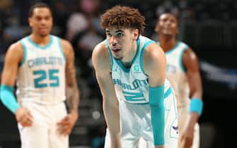 CHARLOTTE, NC - MAY 2:  LaMelo Ball #2 of the Charlotte Hornets looks on during the game against the Miami Heat on May 2, 2021 at Spectrum Center in Charlotte, North Carolina. NOTE TO USER: User expressly acknowledges and agrees that, by downloading and or using this photograph, User is consenting to the terms and conditions of the Getty Images License Agreement. Mandatory Copyright Notice: Copyright 2021 NBAE (Photo by Kent Smith/NBAE via Getty Images)