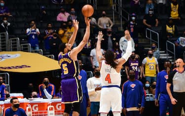 LOS ANGELES, CA - MAY 10: Talen Horton-Tucker #5 of the Los Angeles Lakers shoots a three point basket to win the game against the New York Knicks on May 10, 2021 at STAPLES Center in Los Angeles, California. NOTE TO USER: User expressly acknowledges and agrees that, by downloading and/or using this Photograph, user is consenting to the terms and conditions of the Getty Images License Agreement. Mandatory Copyright Notice: Copyright 2021 NBAE (Photo by Adam Pantozzi/NBAE via Getty Images)