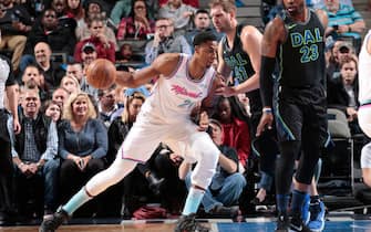 DALLAS, TX - JANUARY 29: Hassan Whiteside #21 of the Miami Heat handles the ball against the Dallas Mavericks on January 29, 2018 at the American Airlines Center in Dallas, Texas. NOTE TO USER: User expressly acknowledges and agrees that, by downloading and or using this photograph, User is consenting to the terms and conditions of the Getty Images License Agreement. Mandatory Copyright Notice: Copyright 2017 NBAE (Photo by Glenn James/NBAE via Getty Images)