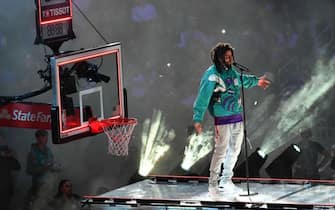 1125557513 CHARLOTTE, USA - FEBRUARY 17: J Cole performs the halftime show at the Team LeBron vs Team Giannis at the 68th NBA Allstar 2019 at Spectrum Arena in Charlotte, NC, United States on February 17, 2019. (Photo by Peter Zay/Anadolu Agency/Getty Images)