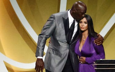 UNCASVILLE, CONNECTICUT - MAY 15: Vanessa Bryant is greeted by presenter Michael Jordan after speaking on behalf of Class of 2020 inductee, Kobe Bryant during the 2021 Basketball Hall of Fame Enshrinement Ceremony at Mohegan Sun Arena on May 15, 2021 in Uncasville, Connecticut. Kobe Bryant tragically died in a California helicopter crash on Jan 26, 2020. (Photo by Maddie Meyer/Getty Images)