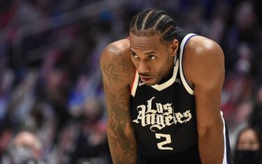 LOS ANGELES, CA - MAY 22: Kawhi Leonard #2 of the LA Clippers looks on during the game against the Dallas Mavericks during Round 1, Game 1 of the the 2021 NBA Playoffs on May 22, 2021 at STAPLES Center in Los Angeles, California. NOTE TO USER: User expressly acknowledges and agrees that, by downloading and/or using this Photograph, user is consenting to the terms and conditions of the Getty Images License Agreement. Mandatory Copyright Notice: Copyright 2021 NBAE (Photo by Juan Ocampo/NBAE via Getty Images)