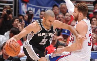LOS ANGELES, CA - MAY 20:  Tony Parker #9 of the San Antonio Spurs drives to the basket against Blake Griffin #32 of the Los Angeles Clippers in Game Four of the Western Conference Semifinals during the 2012 NBA Playoffs at Staples Center on May 20, 2012 in Los Angeles, California. NOTE TO USER: User expressly acknowledges and agrees that, by downloading and/or using this Photograph, user is consenting to the terms and conditions of the Getty Images License Agreement. Mandatory Copyright Notice: Copyright 2012 NBAE (Photo by Andrew D. Bernstein/NBAE via Getty Images)