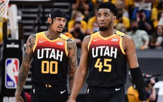 SALT LAKE CITY, UT - JUNE 10: Jordan Clarkson #00 of the Utah Jazz talks to Donovan Mitchell #45 of the Utah Jazz during the game against the LA Clippers during Round 2, Game 2 of the 2021 NBA Playoffs on June 10, 2021 at vivint.SmartHome Arena in Salt Lake City, Utah. NOTE TO USER: User expressly acknowledges and agrees that, by downloading and or using this Photograph, User is consenting to the terms and conditions of the Getty Images License Agreement. Mandatory Copyright Notice: Copyright 2021 NBAE (Photo by Adam Pantozzi/NBAE via Getty Images)