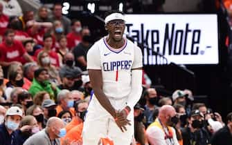 SALT LAKE CITY, UT - JUNE 10: Reggie Jackson #1 of the LA Clippers reacts to his three point basket during the game against the Utah Jazz during Round 2, Game 2 of the 2021 NBA Playoffs on June 10, 2021 at vivint.SmartHome Arena in Salt Lake City, Utah. NOTE TO USER: User expressly acknowledges and agrees that, by downloading and or using this Photograph, User is consenting to the terms and conditions of the Getty Images License Agreement. Mandatory Copyright Notice: Copyright 2021 NBAE (Photo by Adam Pantozzi/NBAE via Getty Images)