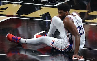 ATLANTA, GEORGIA - JUNE 14:  Joel Embiid #21 of the Philadelphia 76ers reacts after a turnover against the Atlanta Hawks during the second half of game 4 of the Eastern Conference Semifinals at State Farm Arena on June 14, 2021 in Atlanta, Georgia.  NOTE TO USER: User expressly acknowledges and agrees that, by downloading and or using this photograph, User is consenting to the terms and conditions of the Getty Images License Agreement. (Photo by Kevin C. Cox/Getty Images)