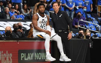 LOS ANGELES, CA - JUNE 18: Donovan Mitchell #45 and Head Coach Quin Snyder of the Utah Jazz look on during the game against the LA Clippers during Round 2, Game 6 of the 2021 NBA Playoffs on June 18, 2021 at STAPLES Center in Los Angeles, California. NOTE TO USER: User expressly acknowledges and agrees that, by downloading and/or using this Photograph, user is consenting to the terms and conditions of the Getty Images License Agreement. Mandatory Copyright Notice: Copyright 2021 NBAE (Photo by Andrew D. Bernstein/NBAE via Getty Images) 