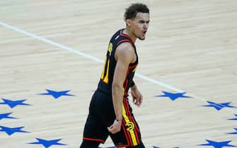 PHILADELPHIA, PENNSYLVANIA - JUNE 20: Trae Young #11 of the Atlanta Hawks celebrates during the fourth quarter against the Philadelphia 76ers during Game Seven of the Eastern Conference Semifinals at Wells Fargo Center on June 20, 2021 in Philadelphia, Pennsylvania. NOTE TO USER: User expressly acknowledges and agrees that, by downloading and or using this photograph, User is consenting to the terms and conditions of the Getty Images License Agreement. (Photo by Tim Nwachukwu/Getty Images)