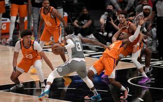 Los Angeles, CA - June 26:  Paul George #13 of the LA Clippers fouls Chris Paul #3 of the Phoenix Suns in the first half of game four of a Western Conference finals NBA playoff basketball game at the Staples Center in Los Angeles on Saturday, June 26, 2021. (Photo by Keith Birmingham/MediaNews Group/Pasadena Star-News via Getty Images)