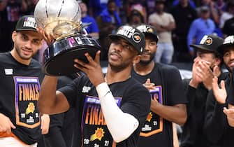 LOS ANGELES, CA - JUNE 30: Chris Paul #3 of the Phoenix Suns holds the Western Conference Finals trophy after Game 6 of the Western Conference Finals of the 2021 NBA Playoffs on June 30, 2021 at STAPLES Center in Los Angeles, California. NOTE TO USER: User expressly acknowledges and agrees that, by downloading and/or using this Photograph, user is consenting to the terms and conditions of the Getty Images License Agreement. Mandatory Copyright Notice: Copyright 2021 NBAE (Photo by Andrew D. Bernstein/NBAE via Getty Images)