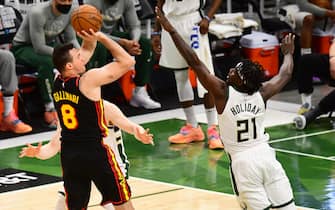 1233761171 MILWAUKEE, WI - JULY 1: Danilo Gallinari #8 of the Atlanta Hawks shoots the ball during the game against the Milwaukee Bucks during Game 5 of the Eastern Conference Finals of the 2021 NBA Playoffs on July 1, 2021 at the Fiserv Forum Center in Milwaukee, Wisconsin. NOTE TO USER: User expressly acknowledges and agrees that, by downloading and or using this Photograph, user is consenting to the terms and conditions of the Getty Images License Agreement. Mandatory Copyright Notice: Copyright 2021 NBAE (Photo by Scott Cunningham/NBAE via Getty Images).