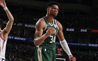 MILWAUKEE, WI - JULY 11: Giannis Antetokounmpo #34 of the Milwaukee Bucks celebrates during Game Three of the 2021 NBA Finals on July 11, 2021 at the Fiserv Forum Center in Milwaukee, Wisconsin. NOTE TO USER: User expressly acknowledges and agrees that, by downloading and or using this Photograph, user is consenting to the terms and conditions of the Getty Images License Agreement. Mandatory Copyright Notice: Copyright 2021 NBAE (Photo by Nathaniel S. Butler/NBAE via Getty Images).