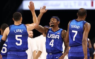 LAS VEGAS, NV - JULY 13: Bradley Beal #4 hi-fives Zach LaVine #5 and Kevin Durant #7 of the USA Men's National Team during the game against the Argentina Men's National Team on July 13, 2021 at Michelob ULTRA Arena in Las Vegas, Nevada. NOTE TO USER: User expressly acknowledges and agrees that, by downloading and or using this photograph, User is consenting to the terms and conditions of the Getty Images License Agreement. (Photo by Stephen Gosling/NBAE via Getty Images)