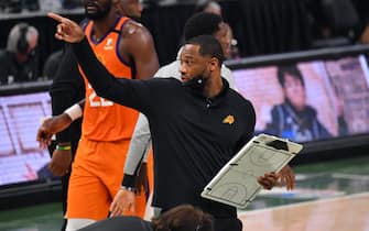 MILWAUKEE, WI - JULY 14: Assistant Coach Willie Green of the Phoenix Suns looks on during Game Four of the 2021 NBA Finals on July 14, 2021 at Fiserv Forum in Milwaukee, Wisconsin. NOTE TO USER: User expressly acknowledges and agrees that, by downloading and/or using this Photograph, user is consenting to the terms and conditions of the Getty Images License Agreement. Mandatory Copyright Notice: Copyright 2021 NBAE (Photo by Jesse D. Garrabrant/NBAE via Getty Images) 