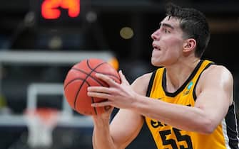 INDIANAPOLIS, IN - MARCH 22: Luka Garza #55 of the Iowa Hawkeyes shoots against the Oregon Ducks in the second round of the 2021 NCAA Division I Mens Basketball Tournament held at Bankers Life Fieldhouse on March 22, 2021 in Indianapolis, Indiana. (Photo by Jack Dempsey/NCAA Photos via Getty Images)
