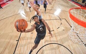 LAS VEGAS, NV - AUGUST 9: DayRon Sharpe #21 of the Brooklyn Nets drives to the basket during the 2021 Las Vegas Summer League on August 9, 2021 at the Cox Pavilion in Las Vegas, Nevada. NOTE TO USER: User expressly acknowledges and agrees that, by downloading and/or using this Photograph, user is consenting to the terms and conditions of the Getty Images License Agreement. Mandatory Copyright Notice: Copyright 2021 NBAE (Photo by David Dow/NBAE via Getty Images)