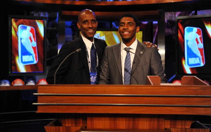 114292433 SECAUCUS, NJ - MAY 17: Kyrie Irving, a 2011 NBA Draft prospect, poses for a picture with his father Drederick prior to the 2011 NBA Draft Lottery at the Studios at NBA Entertainment on May 17, 2011 in Secaucus, New Jersey. NOTE TO USER: User expressly acknowledges and agrees that, by downloading and/or using this Photograph, user is consenting to the terms and conditions of the Getty Images License Agreement. Mandatory Copyright Notice: Copyright 2011 NBAE (Photo by Jesse D. Garrabrant/NBAE via Getty Images)