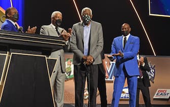 SPRINGFIELD, MA - SEPTEMBER 11: Julius Erving escorts Bill Russell on stage during the 2021 Basketball Hall of Fame Enshrinement Ceremony on September 11, 2021 at MassMutual in Springfield, Massachusetts. NOTE TO USER: User expressly acknowledges and agrees that, by downloading and/or using this photograph, user is consenting to the terms and conditions of the Getty Images License Agreement. Mandatory Copyright Notice: Copyright 2021 NBAE (Photo by Brian Babineau/NBAE via Getty Images)