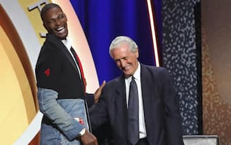 SPRINGFIELD, MA - SEPTEMBER 11: Chris Bosh
smiles and shakes hands with Pat Riley during the 2021 Basketball Hall of Fame Enshrinement Ceremony on September 11, 2021 at MassMutual in Springfield, Massachusetts. NOTE TO USER: User expressly acknowledges and agrees that, by downloading and/or using this photograph, user is consenting to the terms and conditions of the Getty Images License Agreement. Mandatory Copyright Notice: Copyright 2021 NBAE (Photo by Nathaniel S. Butler/NBAE via Getty Images)