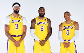 1235580541 EL SEGUNDO, CA - SEPTEMBER 28: Anthony Davis #3, LeBron James #6 and Russell Westbrook #0 of the Los Angeles Lakers poses for a portrait during NBA Media day at UCLA Health Training Center on September 28, 2021 in El Segundo, California. NOTE TO USER: User expressly acknowledges and agrees that, by downloading and/or using this Photograph, user is consenting to the terms and conditions of the Getty Images License Agreement. Mandatory Copyright Notice: Copyright 2021 NBAE (Photo by Adam Pantozzi/NBAE via Getty Images)