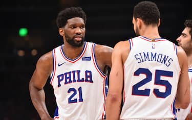 ATLANTA, GA - JUNE 18: Joel Embiid #21 of the Philadelphia 76ers and Ben Simmons #25 of the Philadelphia 76ers talk during a game against the Atlanta Hawks during Round 2, Game 6 of the Eastern Conference Playoffs on June 18, 2021 at State Farm Arena in Atlanta, Georgia. NOTE TO USER: User expressly acknowledges and agrees that, by downloading and/or using this Photograph, user is consenting to the terms and conditions of the Getty Images License Agreement. Mandatory Copyright Notice: Copyright 2021 NBAE (Photo by Jesse D. Garrabrant/NBAE via Getty Images) 